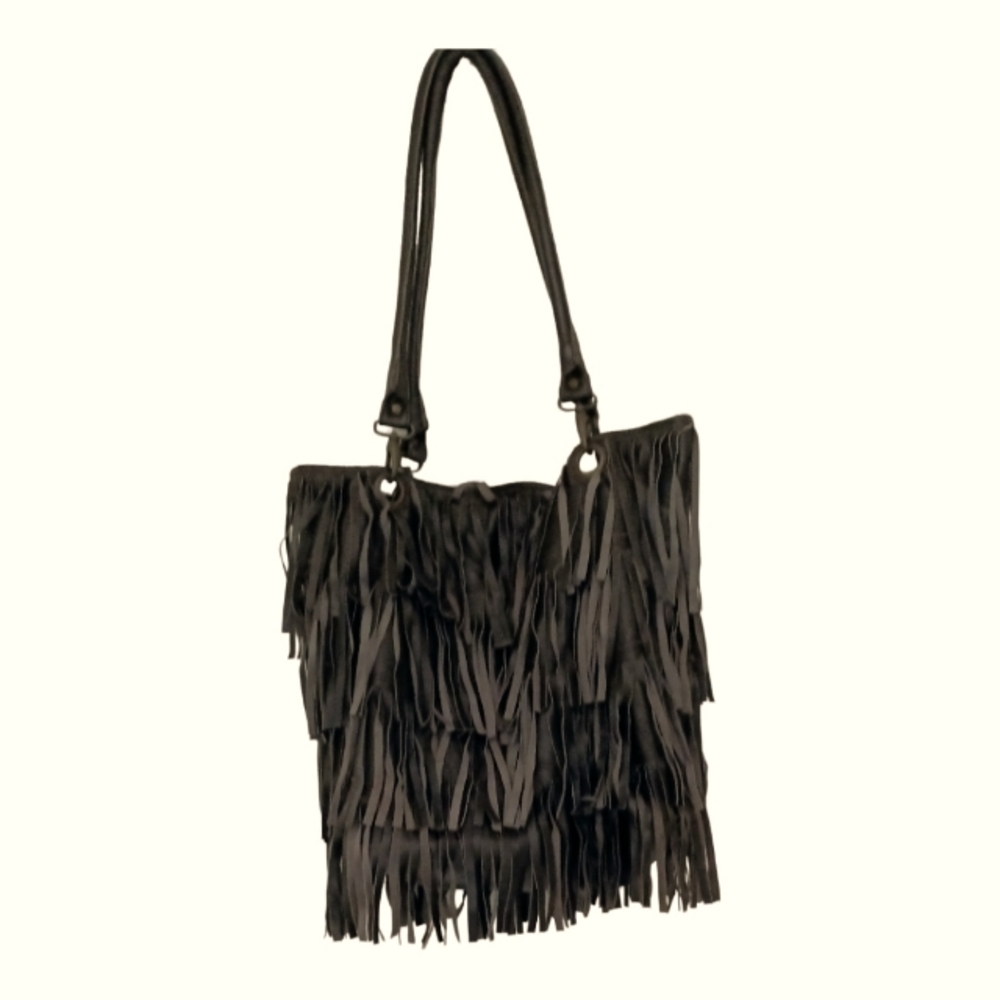 Mirage by Raj Leather shoulder hobo bag. Features fantastic fringe on exterior!